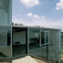 House on a Slope / Dellekamp arquitectos