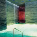 1106348761_inside ONE OF THE INDOOR POOLS