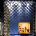 Night view of the east facade with display © Leonardo Finotti Night view of the east facade with display © Leonardo Finotti