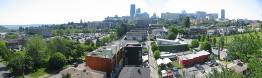 1252958371-seattle-skyline-and-remington-court-photo 1252958371-seattle-skyline-and-remington-court-photo