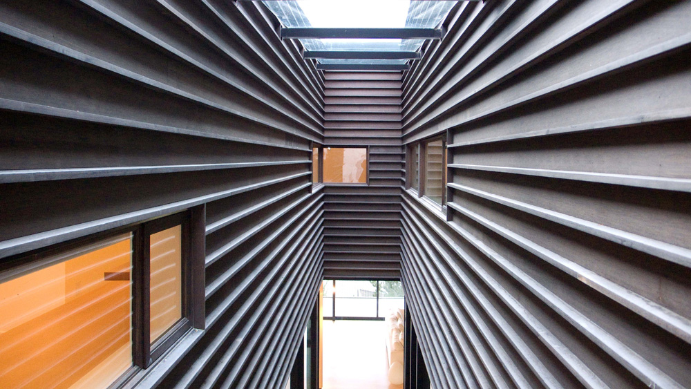 Courtyard House on a Steep Site / Hutchison & Maul Architecture