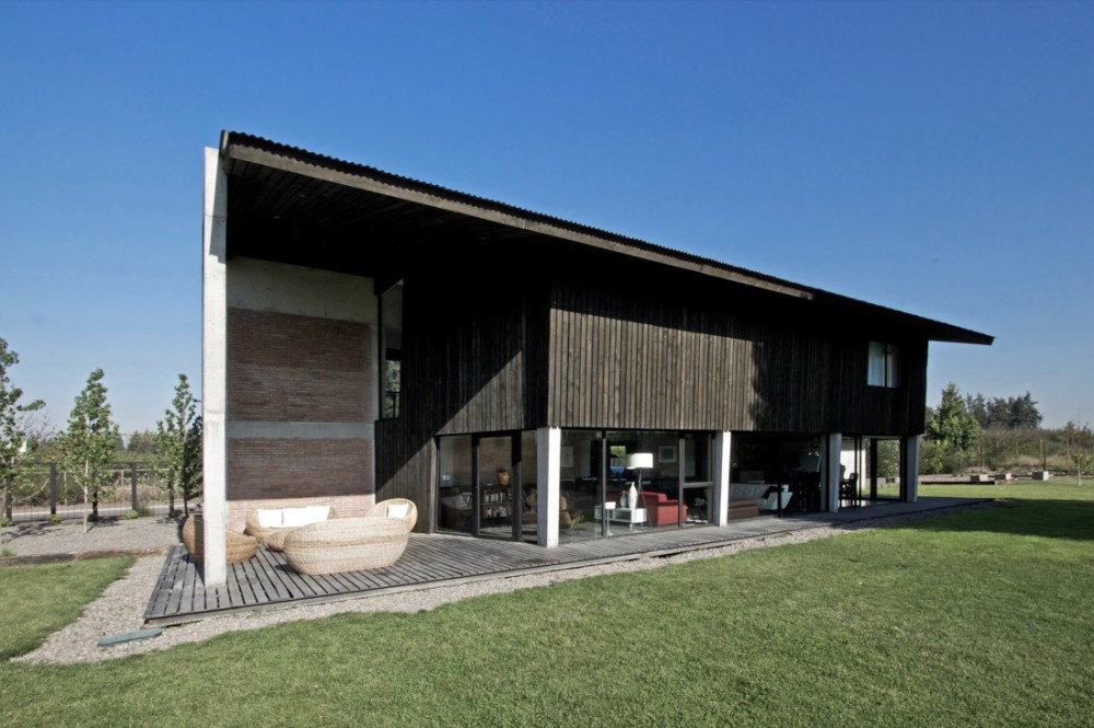 House in Colina / OPA