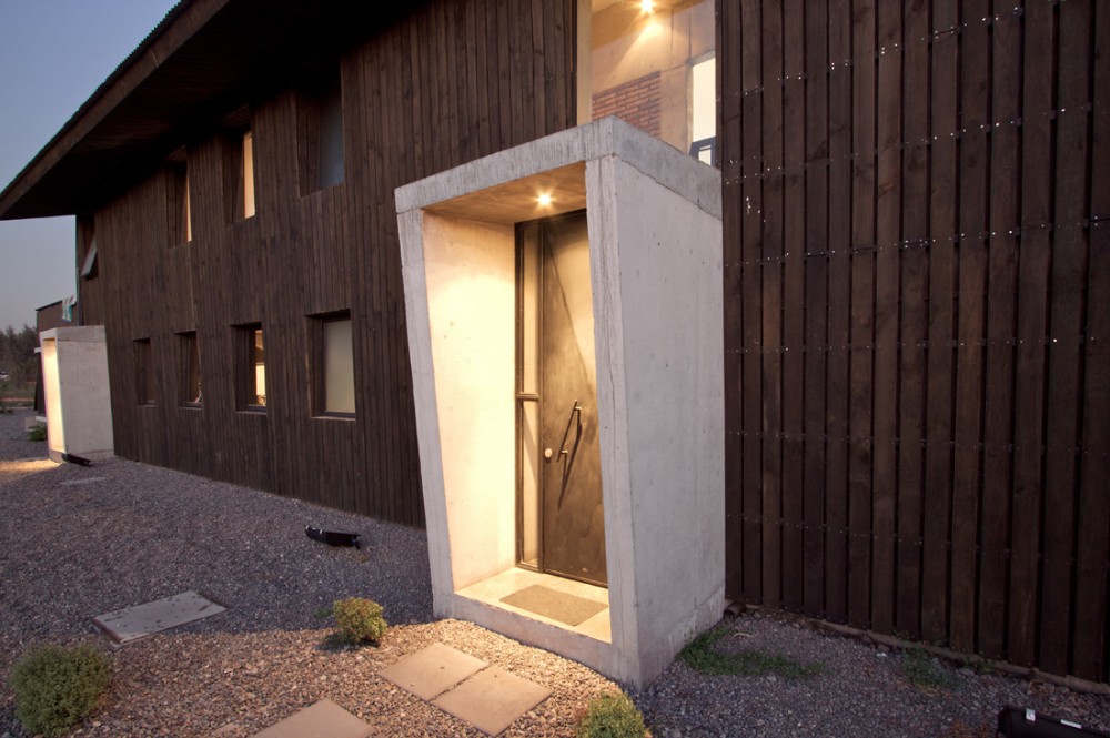 House in Colina / OPA