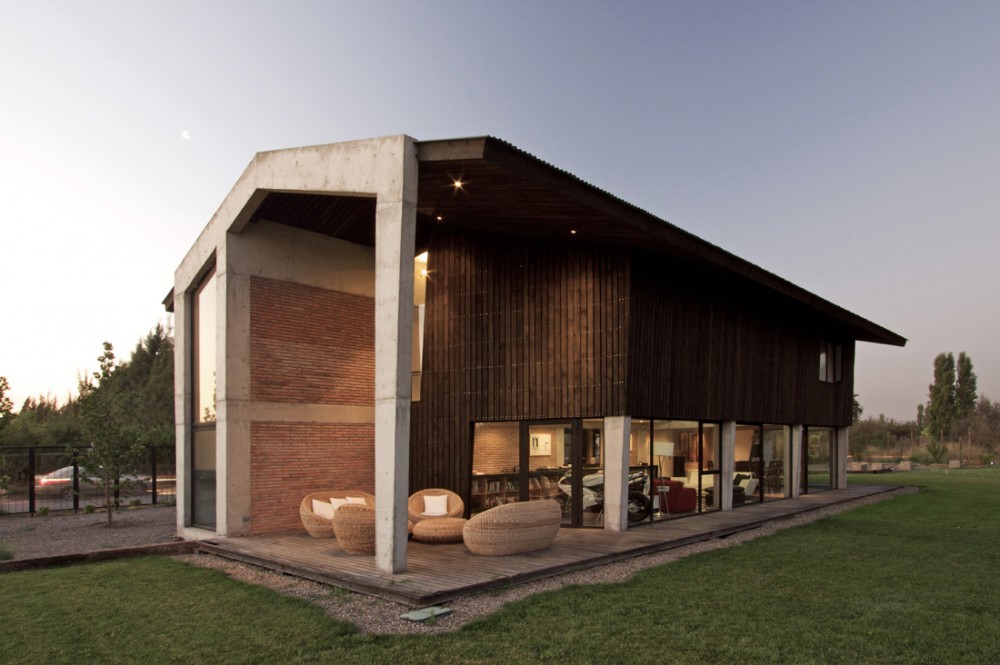 House in Colina / OPA