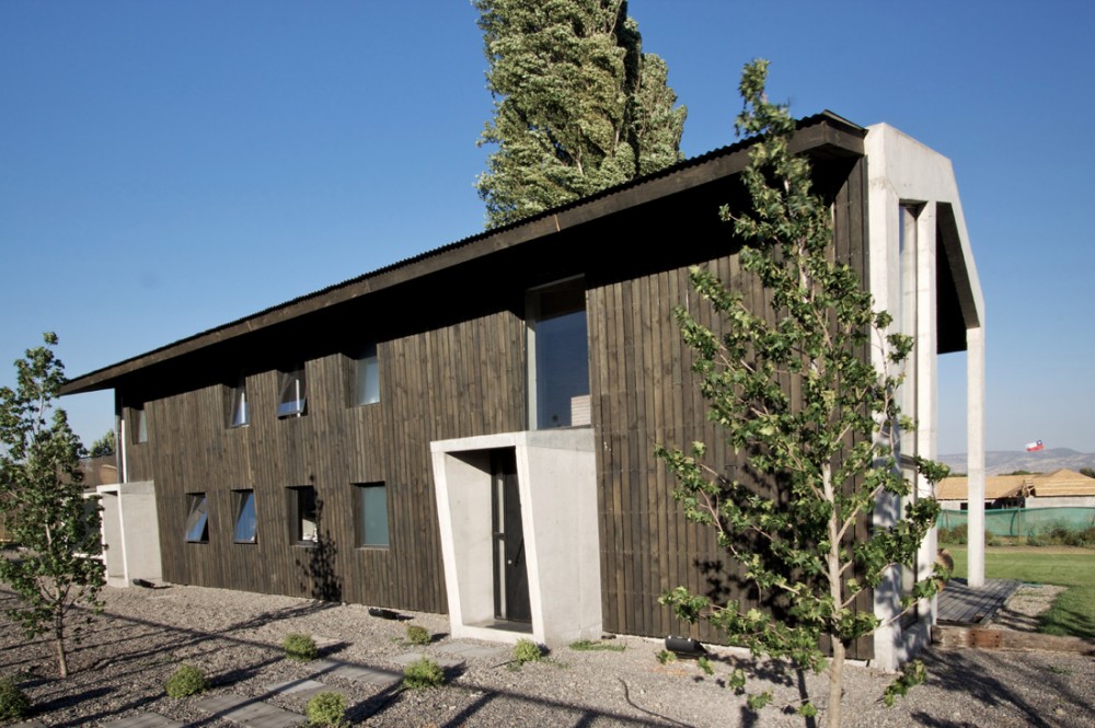 House in Colina / OPA