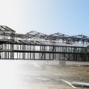 American Canyon High School, American Canyon, CA.  Rendering of BIM model of building structure overlaid with construction photo of steel frame. American Canyon High School, American Canyon, CA. Rendering of BIM model of building structure overlaid with construction photo of steel frame.