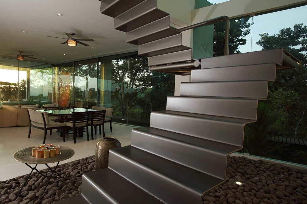 Triangulo House / Ecostudio Architects