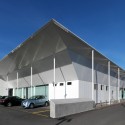 Commercial Building Fratelli Cozzi Auto / Buratti+Battiston Architects Commercial Building Fratelli Cozzi Auto / Buratti+Battiston Architects © Buratti+Battiston Architects