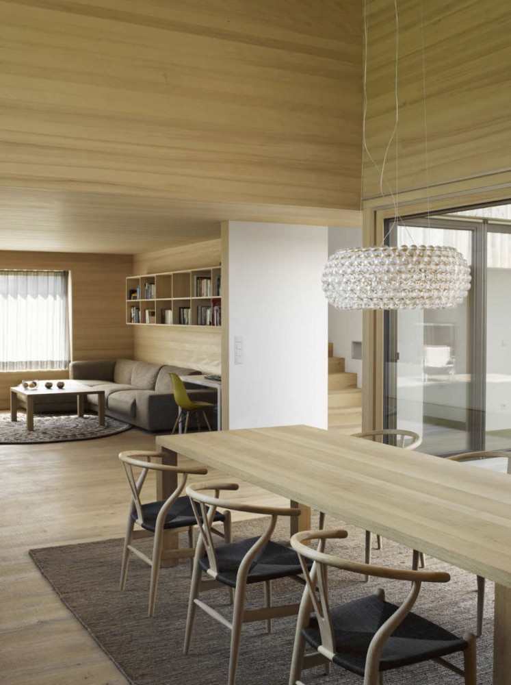 Wooden House with an Inner Courtyard / DI Bernardo Bader