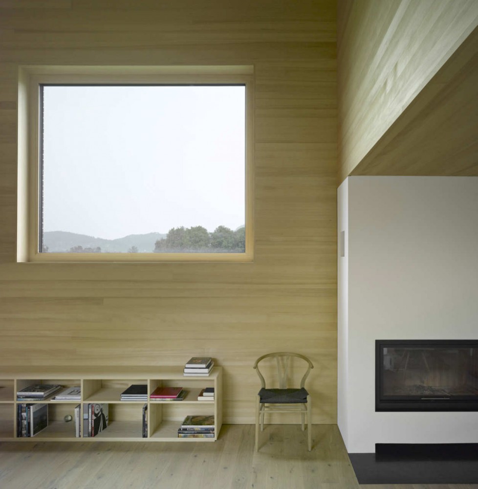 Wooden House with an Inner Courtyard / DI Bernardo Bader