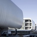The Sheraton Milan Malpensa Airport Hotel & Conference Centre / King Roselli Architetti The Sheraton Milan Malpensa Airport Hotel & Conference Centre / King Roselli Architetti © Santi Caleca
