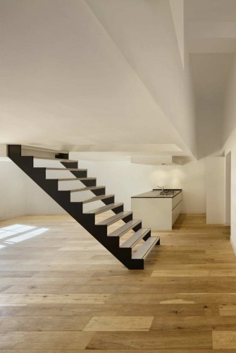Monumental School Reprogrammed Into Apartments / BYTR Architects