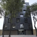 Recycling Building / Alonso de Garay Architects Recycling Building / Alonso de Garay Architects © Jimena Carranza