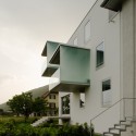 Pieterlen Appartment Building / bauzeit architekten Pieterlen Appartment Building / bauzeit architekten © Yves André