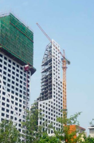 Steven Holl Architects’ Sliced Porosity Block Tops Out (2)