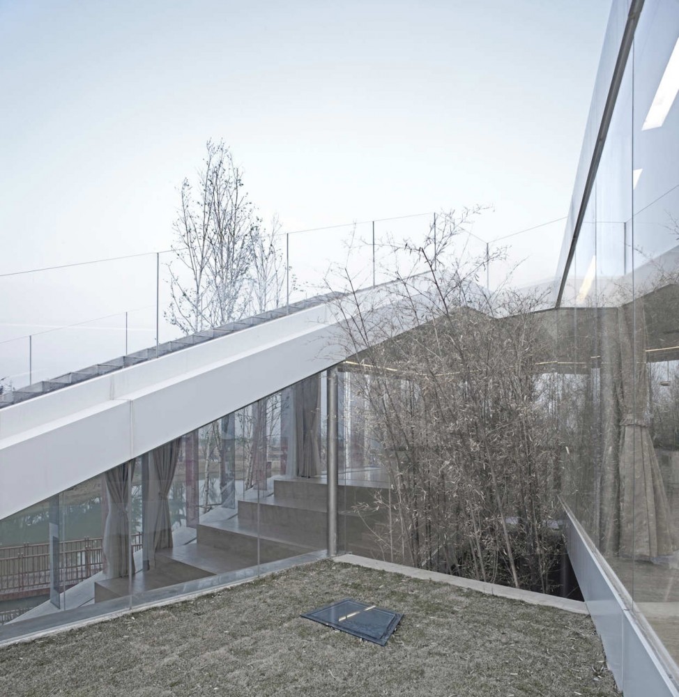 Riverside Clubhouse / TAO