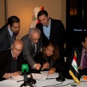 ZHA_CBI (6) ZHA_CBI (6) H.E. Dr Sinan Al-Shabibi, Governor of the Central Bank of Iraq and Zaha Hadid sign the argreement assisted by Mr Noaman Muna CBI Headquaters Project Manager - Courtesy of Zaha Hadid Architects