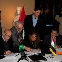 ZHA_CBI (7) ZHA_CBI (7) H.E. Dr Sinan Al-Shabibi, Governor of the Central Bank of Iraq and Zaha Hadid sign the argreement assisted by Mr Noaman Muna CBI Headquaters Project Manager - Courtesy of Zaha Hadid Architects