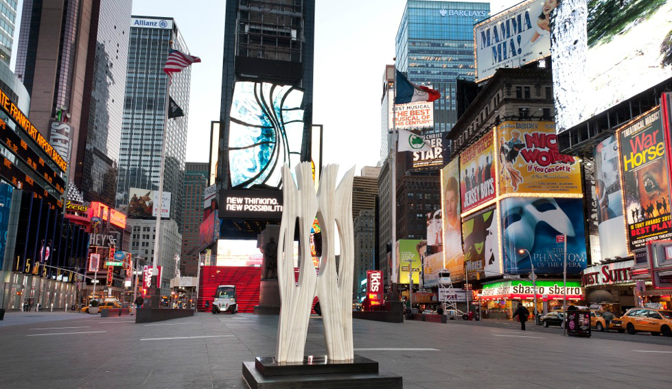 Phantom Oil Pumps and a Soaring Marble Column Arrive in Times Square
