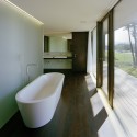 House LK / Dietrich Untertrifaller Staheli Architekten © Bruno Klomfar