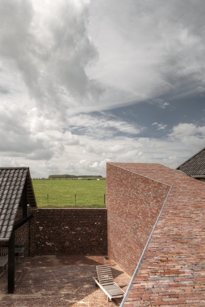 House DM / Lensass Architects
