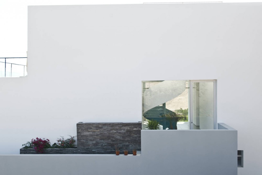 Las Palmeras Beach House / RRMR Arquitectos