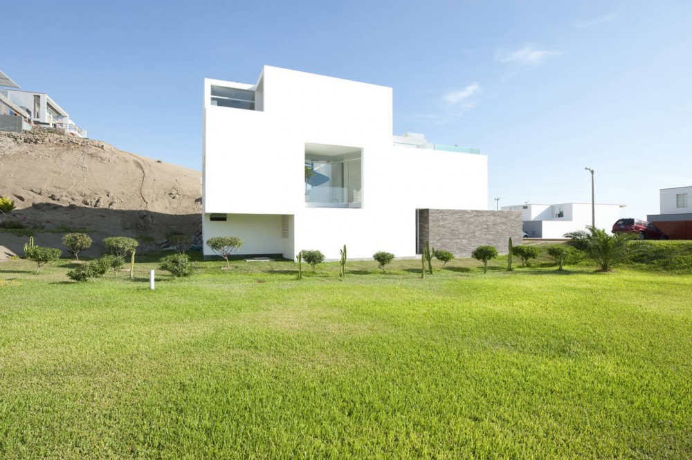 Las Palmeras Beach House / RRMR Arquitectos