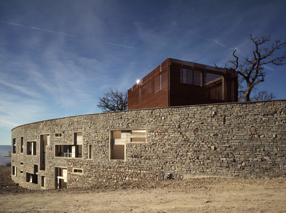 Health Centre and Houses for Elderly People / IPOSTUDIO Architects