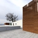 Health Centre and Houses for Elderly People / IPOSTUDIO Architects © Pietro Savorelli