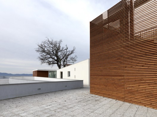 Health Centre and Houses for Elderly People / IPOSTUDIO Architects