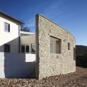 Health Centre and Houses for Elderly People / IPOSTUDIO Architects © Pietro Savorelli