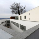 Health Centre and Houses for Elderly People / IPOSTUDIO Architects © Pietro Savorelli