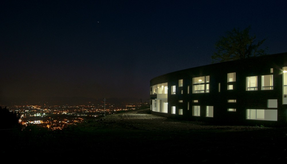 Health Centre and Houses for Elderly People / IPOSTUDIO Architects