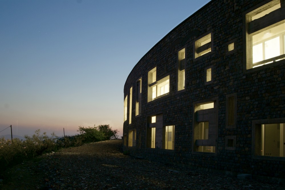 Health Centre and Houses for Elderly People / IPOSTUDIO Architects
