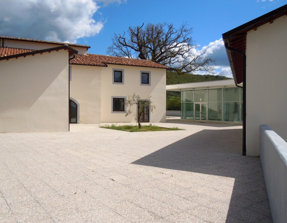 Health Centre and Houses for Elderly People / IPOSTUDIO Architects
