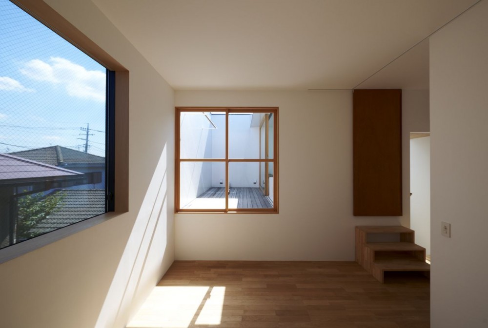 House in Futakoshinchi / Tato Architects