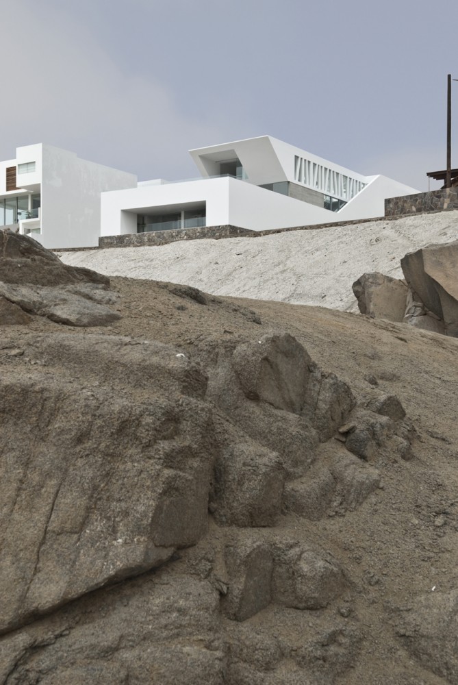 House Playa El Golf H4 / RRMR Arquitectos