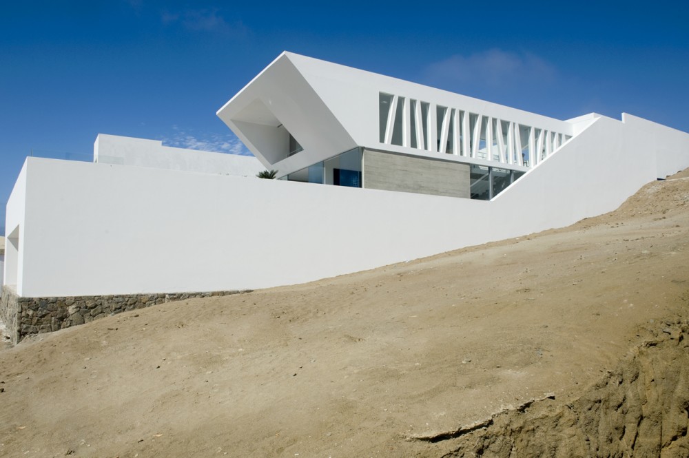 House Playa El Golf H4 / RRMR Arquitectos