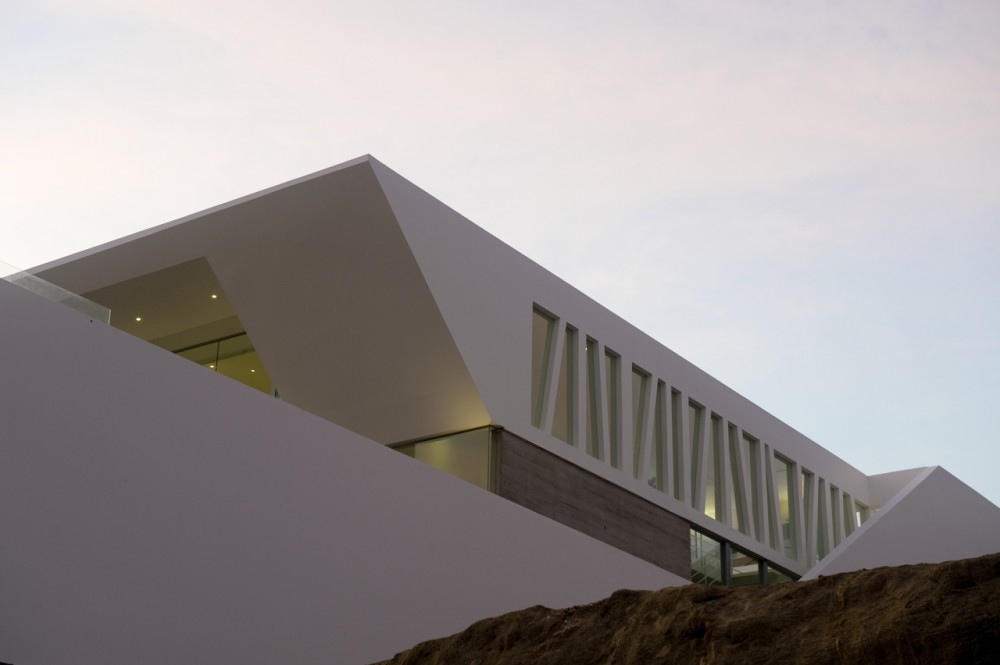 House Playa El Golf H4 / RRMR Arquitectos