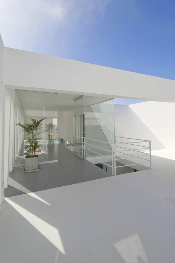 House Playa El Golf H4 / RRMR Arquitectos