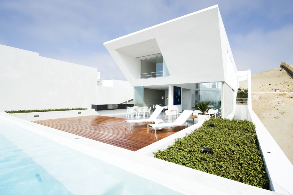 House Playa El Golf H4 / RRMR Arquitectos