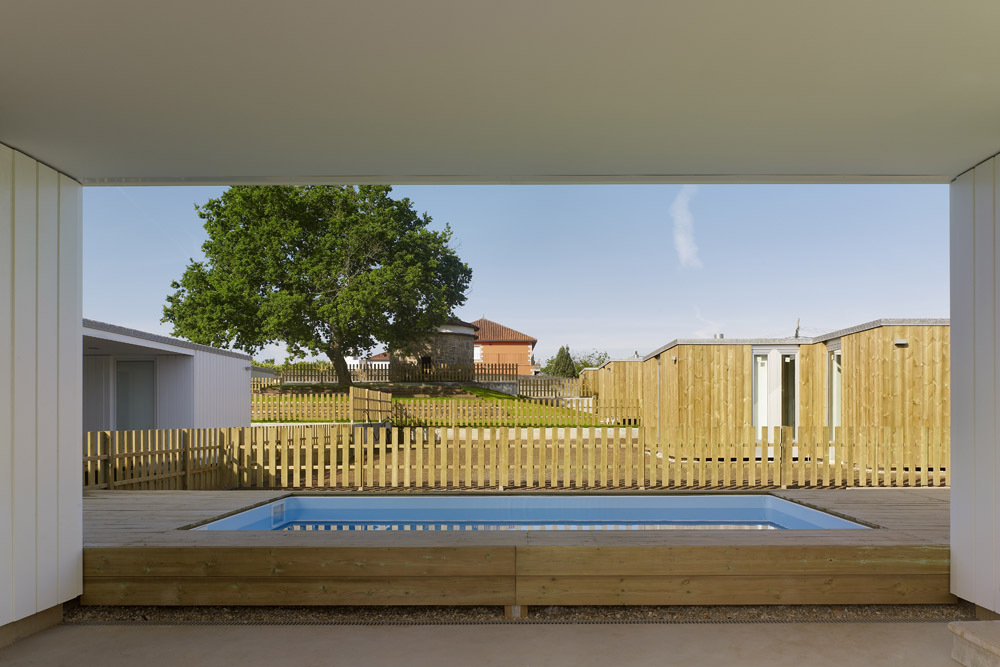 Seven Modular Housing in Covas / Salgado e Liñares Architects
