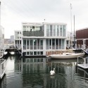 Venice Biennale 2012: British Pavilion presents "Venice Takeaway" (4) Swan swimming amongst waterhouses, IJburg, Waterbuurt West, Amsterdam / dRMM - Courtesy of the British Council