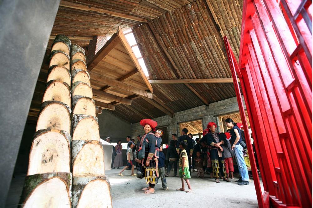 Ta Phin community house / 1+1>2