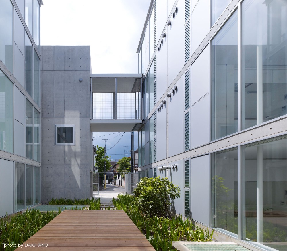 Yutenji Apartments / architecture WORKSHOP