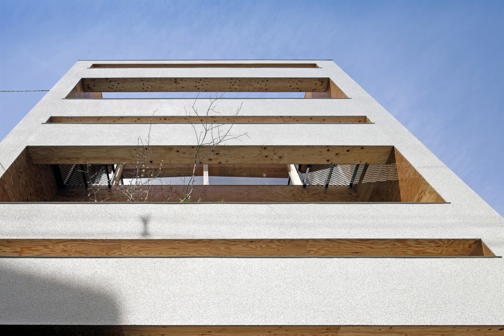Machi-Building / UID Architects
