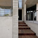 House 0214 / Simpraxis Architects House 0214 / Simpraxis Architects Courtesy of Simpraxis Architects