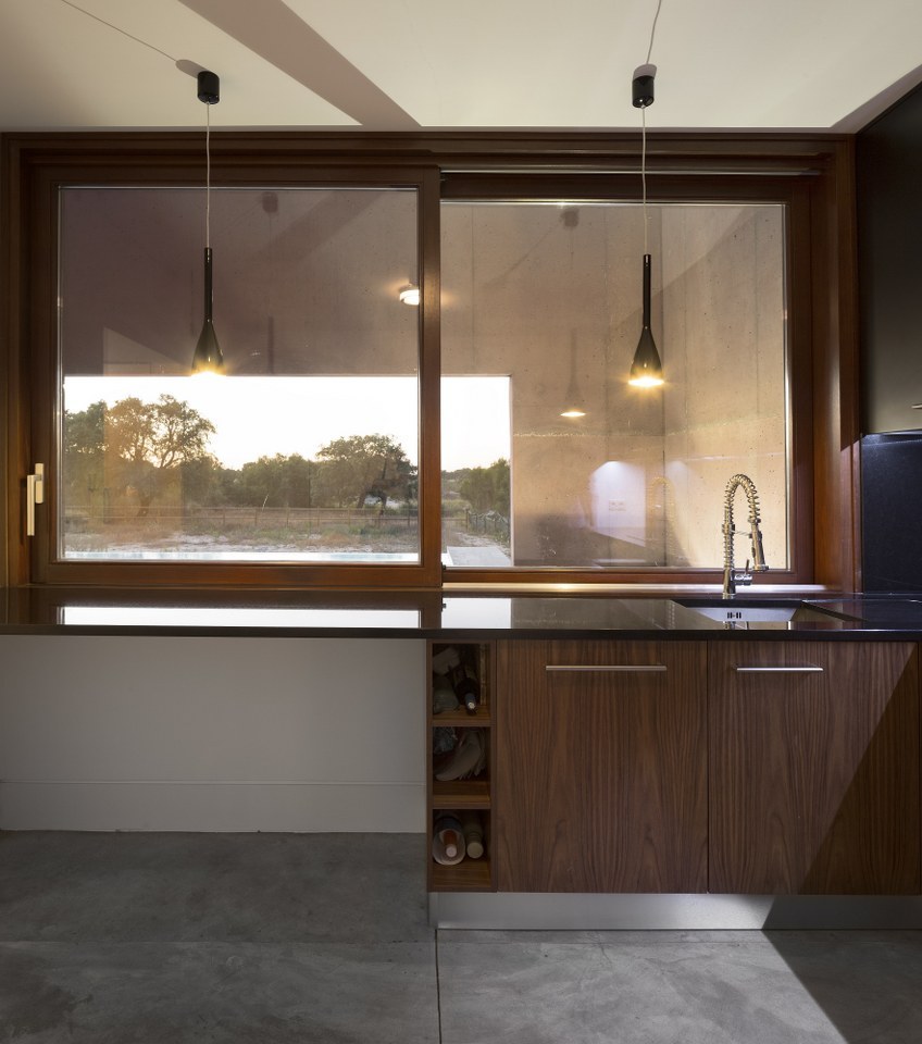 Three Courtyards House / Miguel Marcelino