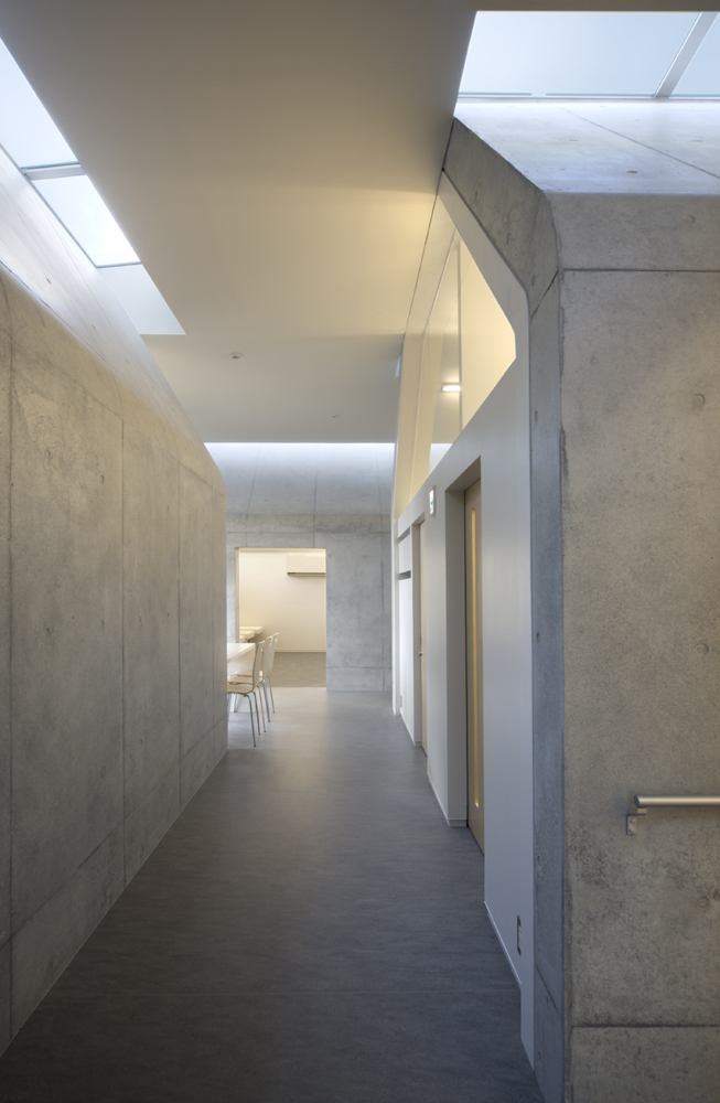 9 Gathered Huts / NKS Architects