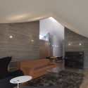 Broken Pitched Roof House / NKS Architects Broken Pitched Roof House / NKS Architects Courtesy of NKS Architects
